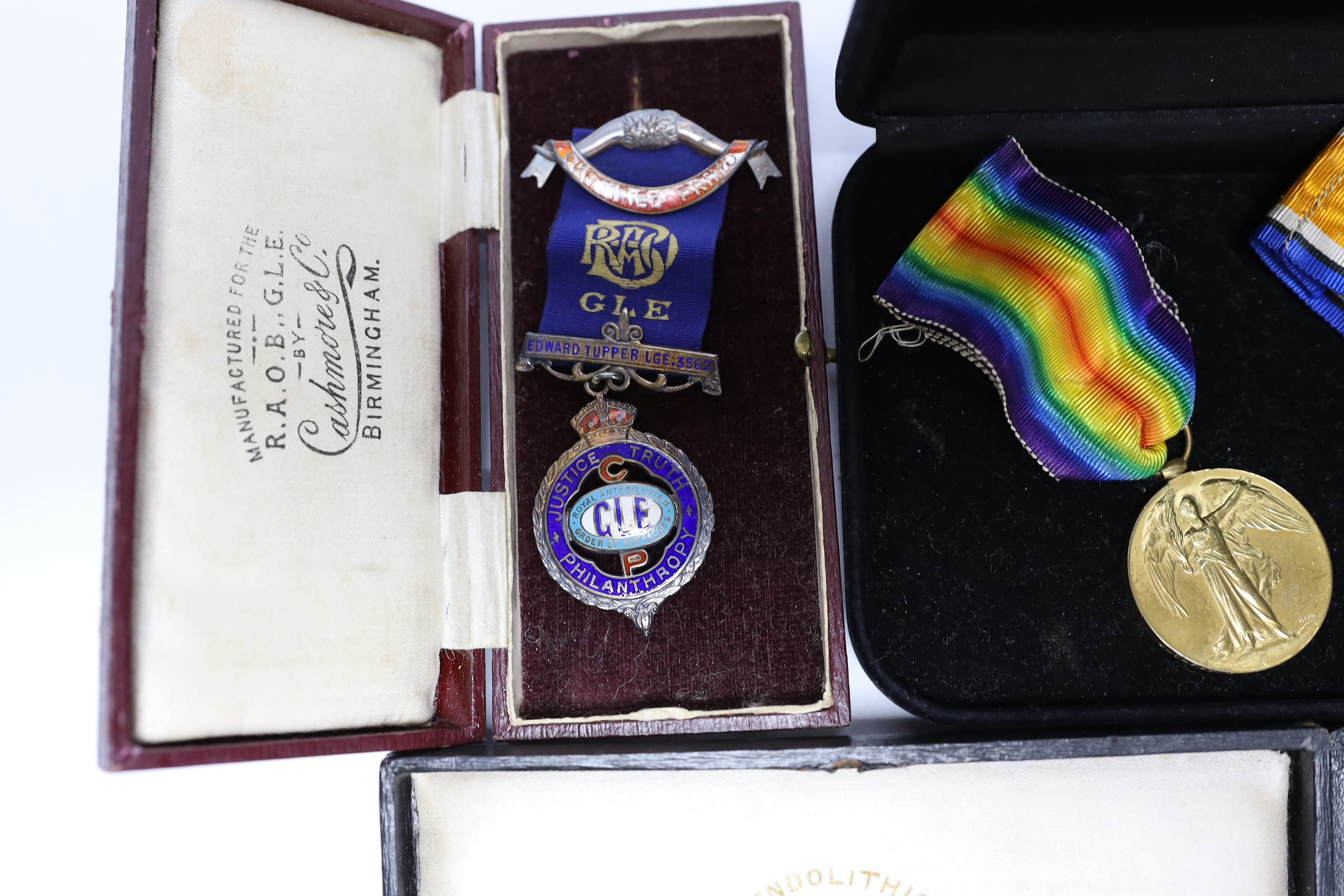 WWI trio awarded to CMT - 735 PTE A E COX ASC, three cased silver Masonic medals, two with enamel together with another empty Masonic related case